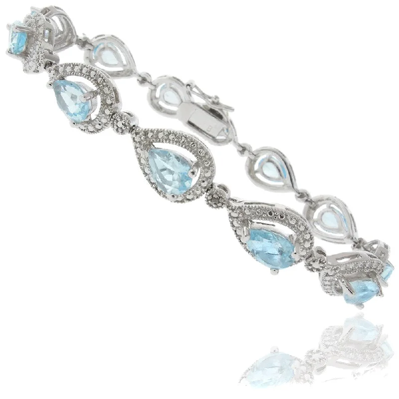 Dolce Giavonna Silver Overlay Blue Topaz and Diamond Accent Teardrop Link Bracelet