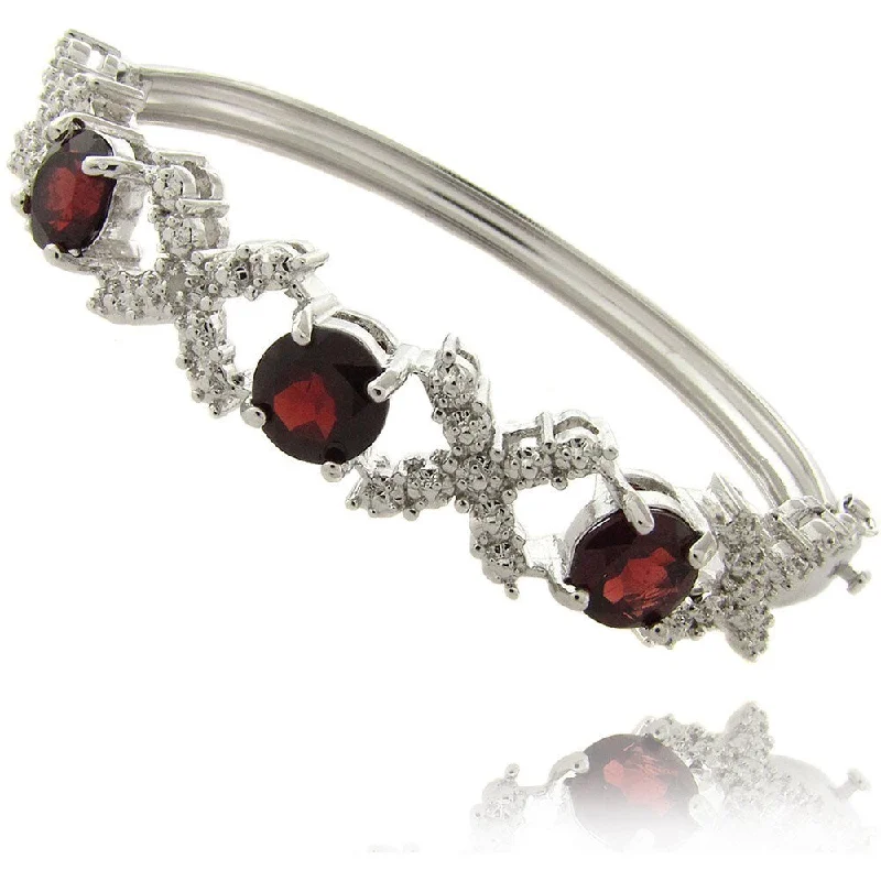 Dolce Giavonna Silverplated Garnet and Diamond Accent 'X' and 'O' Bangle Bracelet