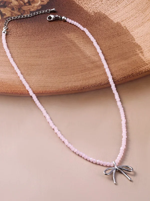 Rhodium Plated Soft Pink Beaded Necklace with Silver Bow Pendant